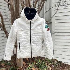 Adidas jacket with patches on arms.